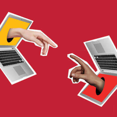 two laptop two hands reaching out of the screens toward each other